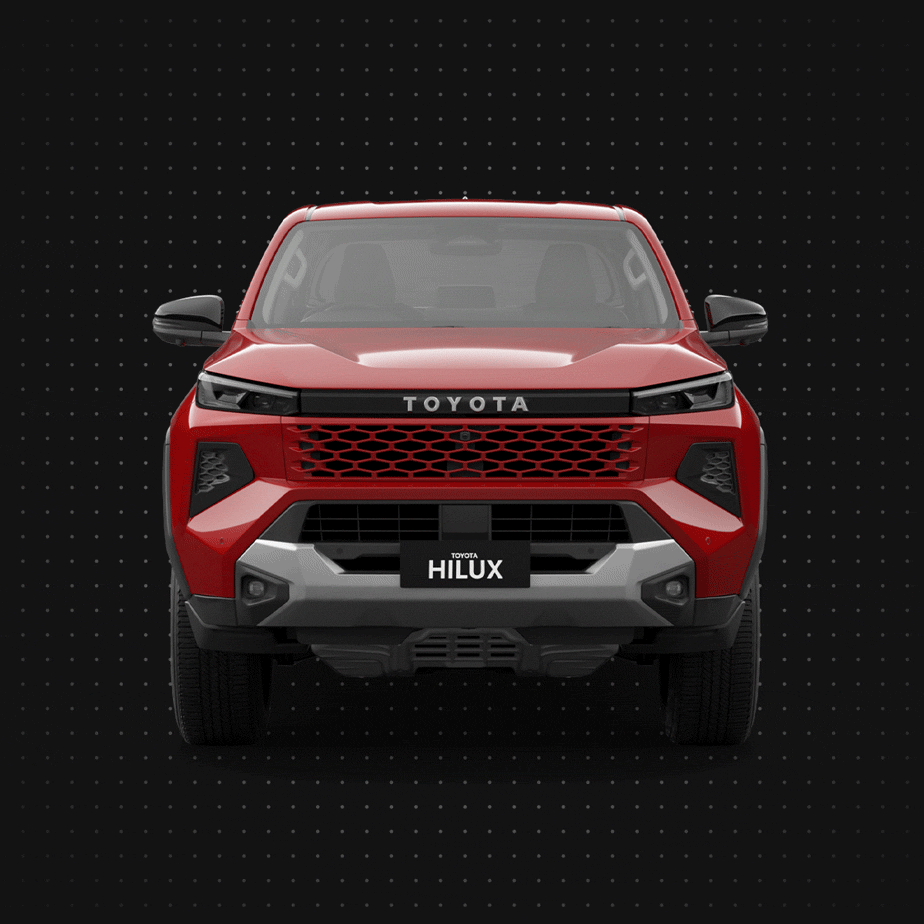 A head-on view of the Toyota HiLux Rogue in Feverish Red. White circular lines radiate from the centre and gently pulse.
