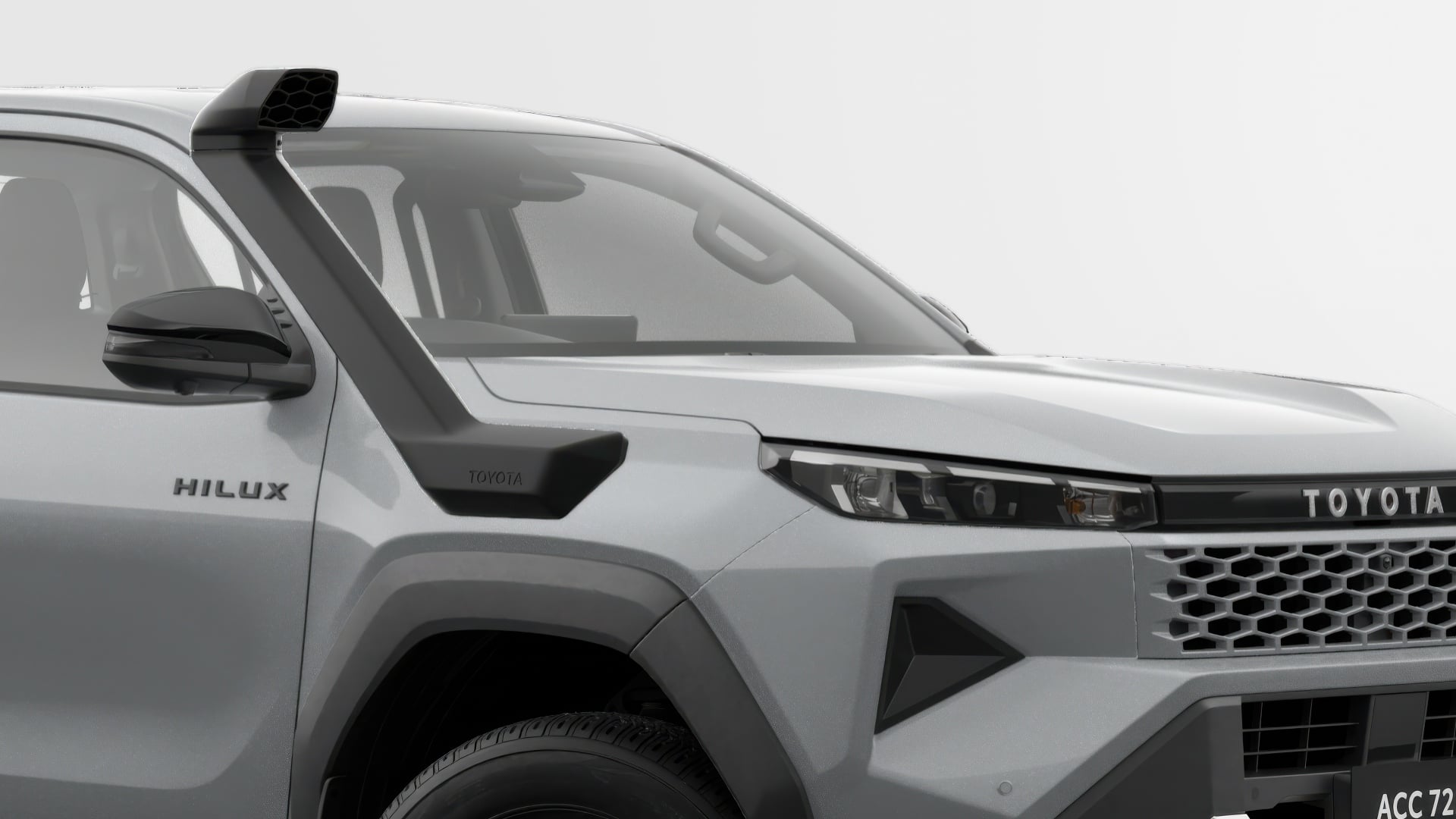 A Stunning Silver Toyota HiLux SR5 double-cab ute is shown in a studio setting. A black Snorkel accessory is prominently displayed, fitted vertically on the driver's side fender panel. The background is white.